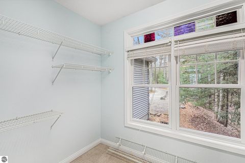 Tiny photo for 410 S Golden Beach Drive, Kewadin, MI 49648 (MLS # 1933860)