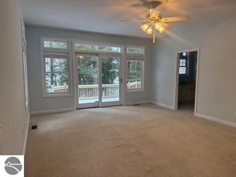 Tiny photo for 410 S Golden Beach Drive, Kewadin, MI 49648 (MLS # 1933860)