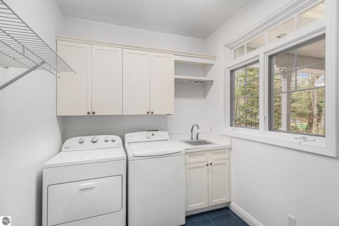 Tiny photo for 410 S Golden Beach Drive, Kewadin, MI 49648 (MLS # 1933860)