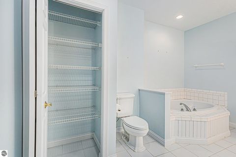 Tiny photo for 410 S Golden Beach Drive, Kewadin, MI 49648 (MLS # 1933860)