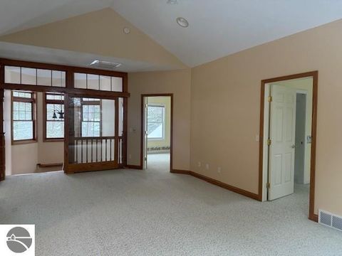 Tiny photo for 410 S Golden Beach Drive, Kewadin, MI 49648 (MLS # 1933860)