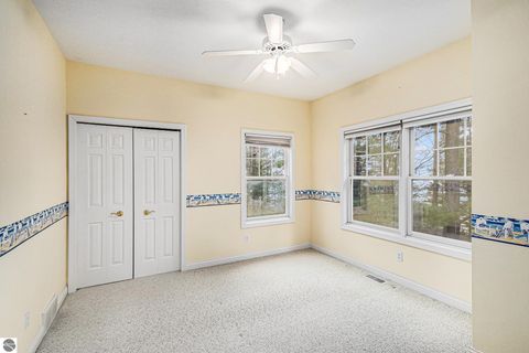 Tiny photo for 410 S Golden Beach Drive, Kewadin, MI 49648 (MLS # 1933860)