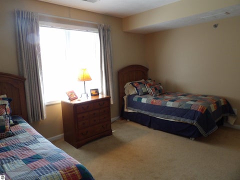 Tiny photo for 1246 Sunnyside Drive #406, Cadillac, MI 49601 (MLS # 1949958)