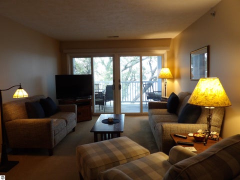 Tiny photo for 1246 Sunnyside Drive #406, Cadillac, MI 49601 (MLS # 1949958)