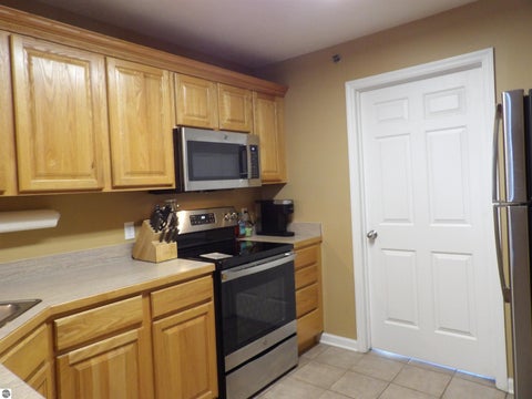 Tiny photo for 1246 Sunnyside Drive #406, Cadillac, MI 49601 (MLS # 1949958)