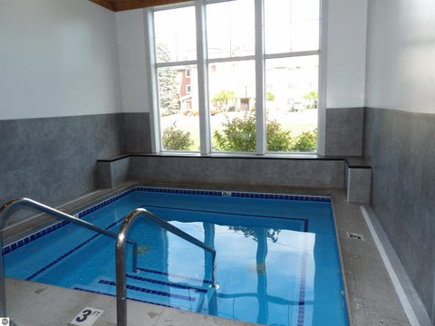 Tiny photo for 1246 Sunnyside Drive #406, Cadillac, MI 49601 (MLS # 1949958)