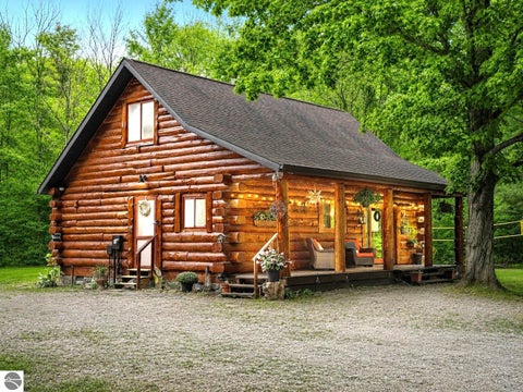 Photo of 9098 Sunset Trail, NE, Mancelona, MI 49659 (MLS # 1947468)