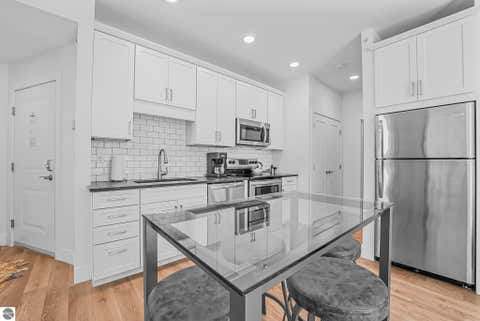 Photo of 135 E Eighth Street, Traverse City, MI 49684 (MLS # 1945553)