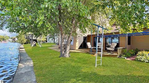 Tiny photo for 311 E Lake Mitchell Drive, Cadillac, MI 49601 (MLS # 1947371)