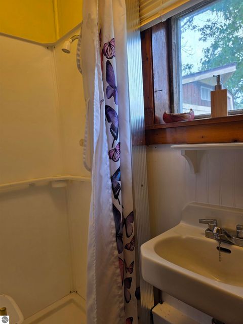 Tiny photo for 808 W Lake Street, Tawas City, MI 48763 (MLS # 1947395)