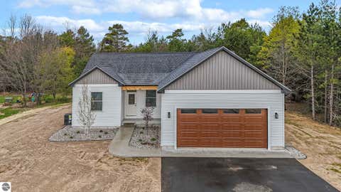 Photo of 3038 Michele Marie, Grawn, MI 49637 (MLS # 1949880)