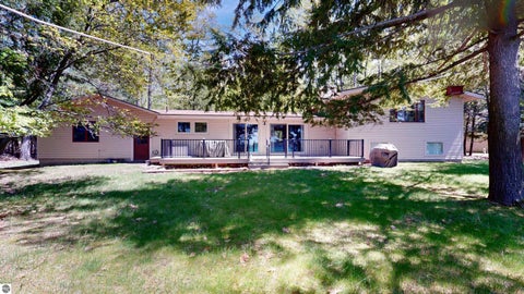 Photo of 8645 Skegemog Point Road, Williamsburg, MI 49690 (MLS # 1946798)