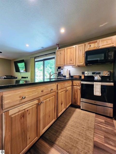 Tiny photo for 9817 Montrose Drive, Mancelona, MI 49659 (MLS # 1948076)