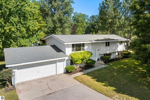 Photo of 8877 US-31 N, Williamsburg, MI 49690 (MLS # 1950099)