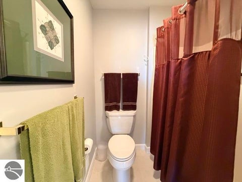 Tiny photo for 911 W Lake Street #4, Tawas City, MI 48763 (MLS # 1951475)
