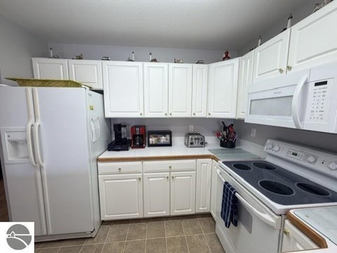 Tiny photo for 911 W Lake Street #4, Tawas City, MI 48763 (MLS # 1951475)