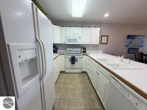Tiny photo for 911 W Lake Street #4, Tawas City, MI 48763 (MLS # 1951475)