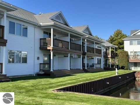 Tiny photo for 911 W Lake Street #4, Tawas City, MI 48763 (MLS # 1951475)