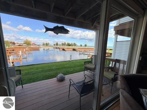 Tiny photo for 911 W Lake Street #4, Tawas City, MI 48763 (MLS # 1951475)