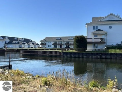 Tiny photo for 911 W Lake Street #4, Tawas City, MI 48763 (MLS # 1951475)