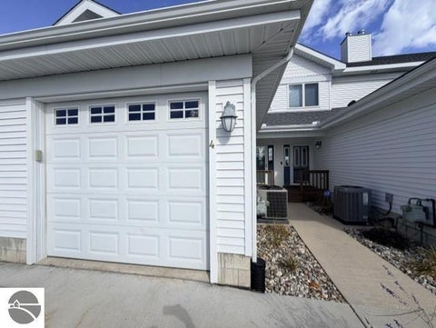 Tiny photo for 911 W Lake Street #4, Tawas City, MI 48763 (MLS # 1951475)