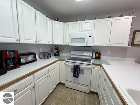Tiny photo for 911 W Lake Street #4, Tawas City, MI 48763 (MLS # 1951475)