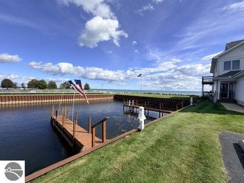 Tiny photo for 911 W Lake Street #4, Tawas City, MI 48763 (MLS # 1951475)