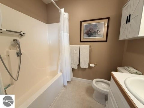 Tiny photo for 911 W Lake Street #4, Tawas City, MI 48763 (MLS # 1951475)