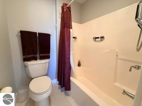 Tiny photo for 911 W Lake Street #4, Tawas City, MI 48763 (MLS # 1951475)