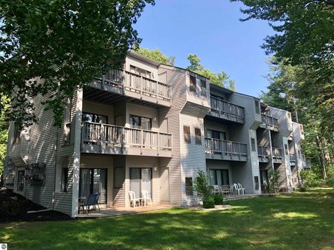 Photo of 5663 Creeks Crossing, Williamsburg, MI 49690 (MLS # 1945768)
