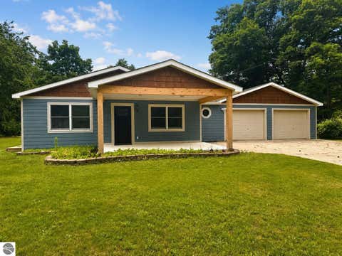 Photo of 1009 Keystone RD, Tawas City, MI 48763 (MLS # 1947610)