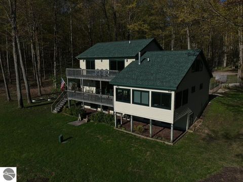 Photo of 420 W Beech Bark Trail, Maple City, MI 49664 (MLS # 1942103)
