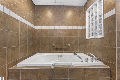 Tiny photo for 420 W Beech Bark Trail, Maple City, MI 49664 (MLS # 1942103)