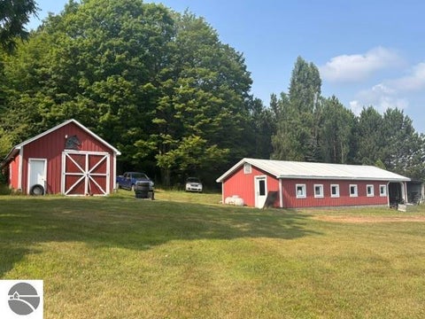 Photo of 601 Kresnak RD, Mancelona, MI 49659 (MLS # 1948736)