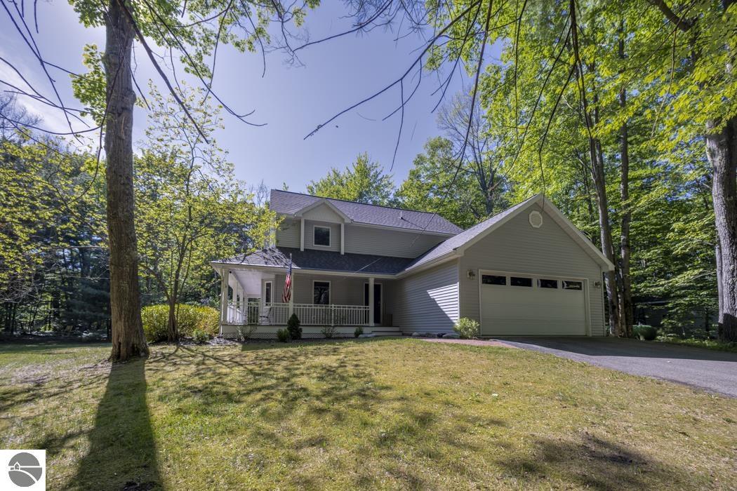 Photo 1 of 72 — 151 Dubonnet Trail, Interlochen, MI 49643