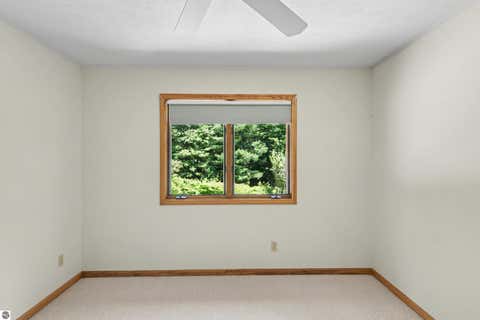 Tiny photo for 1225 Fernwood Drive, Grawn, MI 49637 (MLS # 1948300)