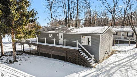 Photo of 6820 W Shore Drive, Weidman, MI 48893 (MLS # 1942300)