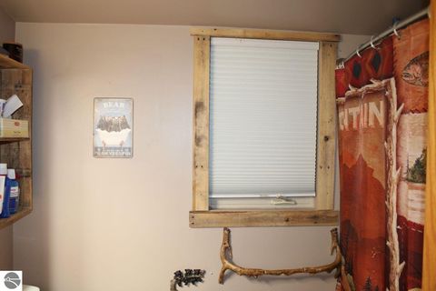 Tiny photo for 72 NW Wood Road, Rapid City, MI 49676 (MLS # 1942479)