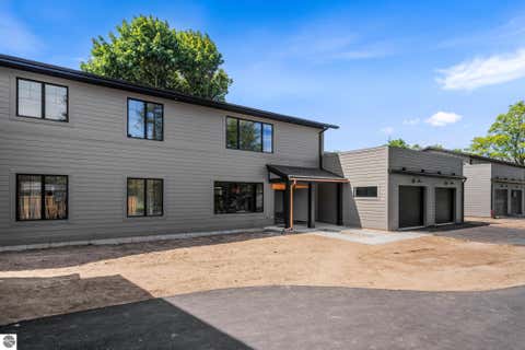 Tiny photo for 1002 May Street #4, Charlevoix, MI 49720 (MLS # 1947896)