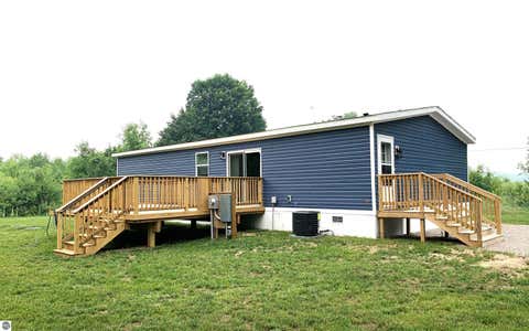 Tiny photo for 1406 SW M-66, Kalkaska, MI 49646 (MLS # 1948070)