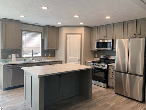 Tiny photo for 1406 SW M-66, Kalkaska, MI 49646 (MLS # 1948070)