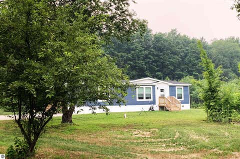 Tiny photo for 1406 SW M-66, Kalkaska, MI 49646 (MLS # 1948070)