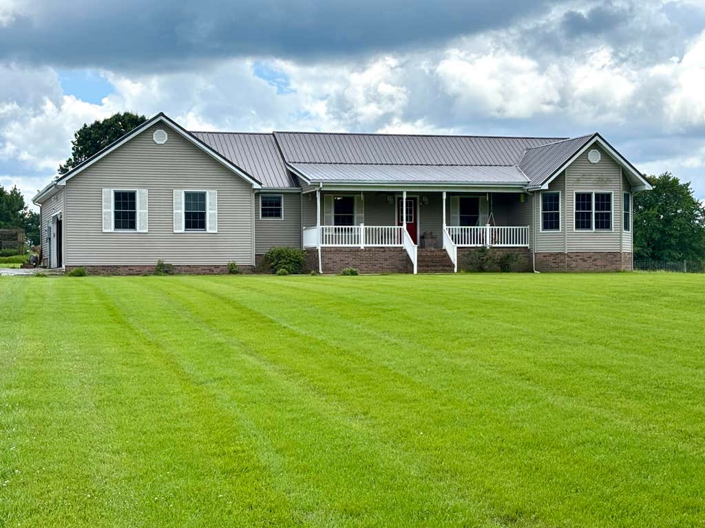 Photo of 153 Webster Lane, Calvert City, KY 42029 (MLS # 26020163)