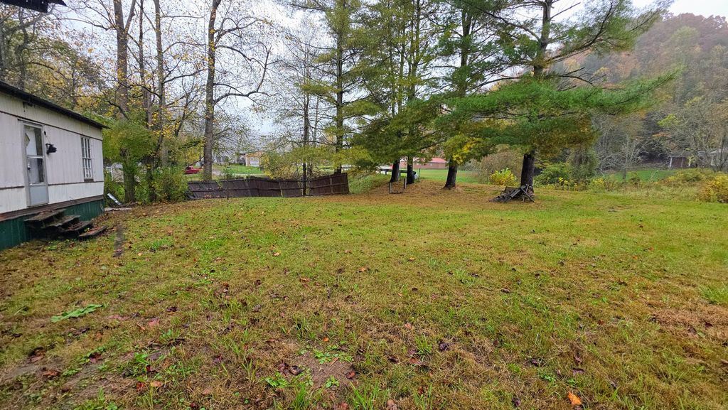 Photo of 5939 KY-66, Big Creek, KY 40914 (MLS # 25505006)