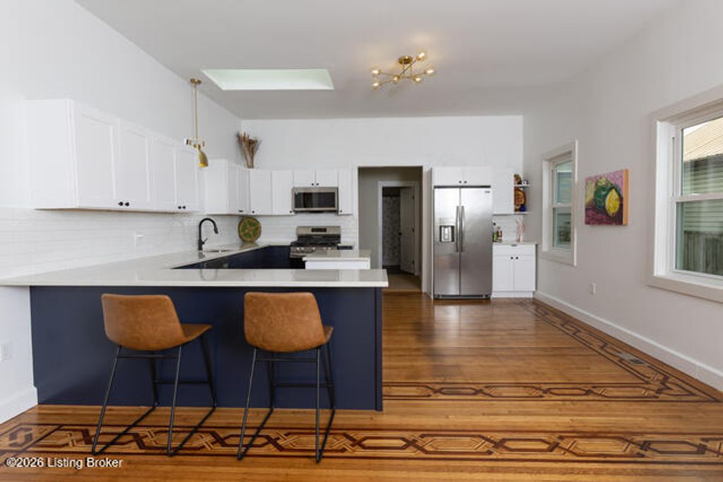 Photo of 1004 Ash St, Louisville, KY 40217 (MLS # 1710118)