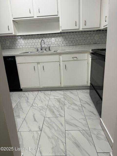 Photo of 7066 Wildwood Cir #APT 143, Louisville, KY 40291 (MLS # 1705763)