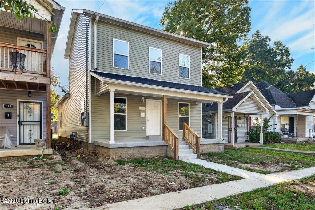 Photo of 813 Louis Coleman Jr Dr, Louisville, KY 40211 (MLS # 1732909)