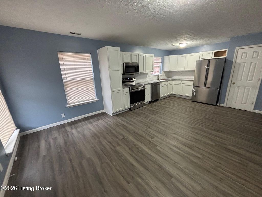 Photo of 2122 W Jefferson St, Louisville, KY 40212 (MLS # 1711128)