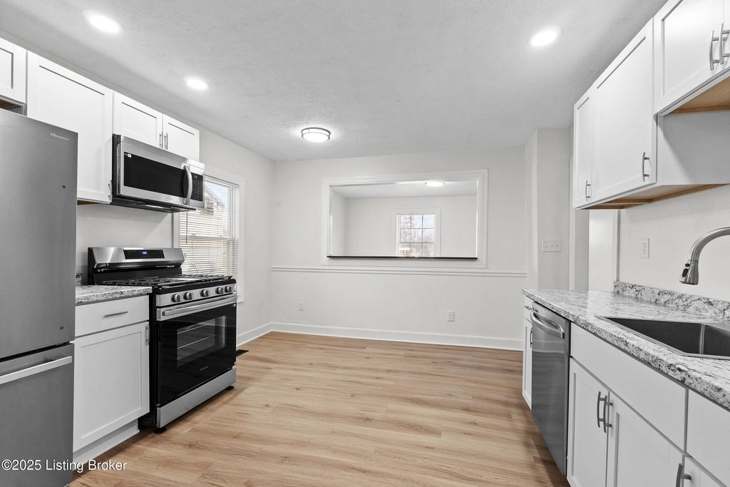 Photo of 5106 Laughlin Ave, Louisville, KY 40214 (MLS # 1704861)