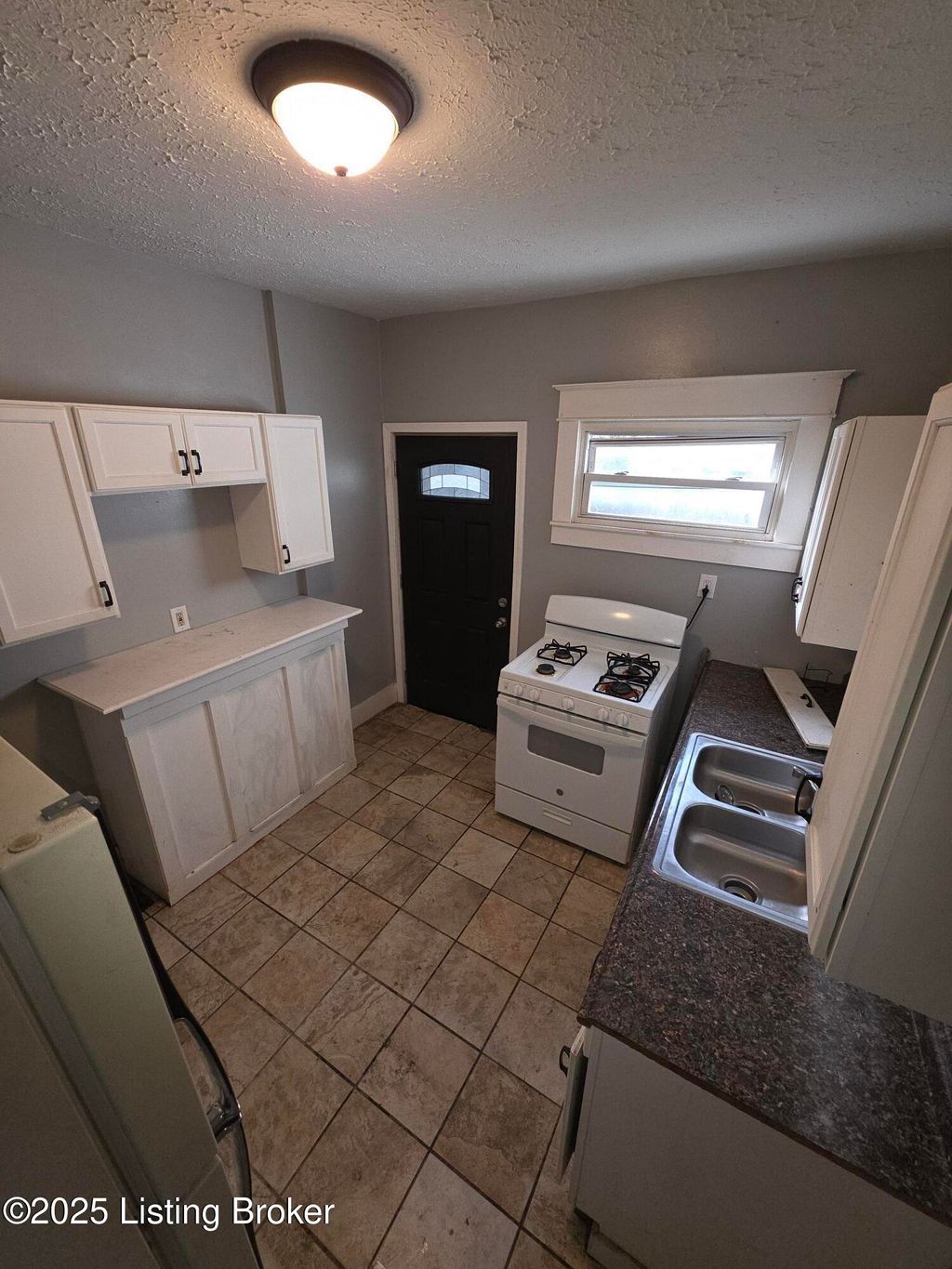 Photo of 1412 Beech St, Louisville, KY 40211 (MLS # 1705651)